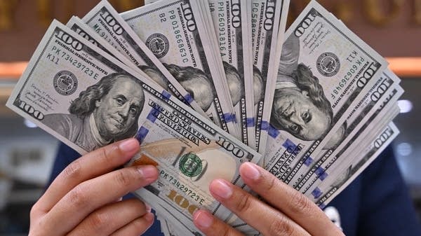 Dollar Slides on Stock Strength and Weak Consumer Sentiment